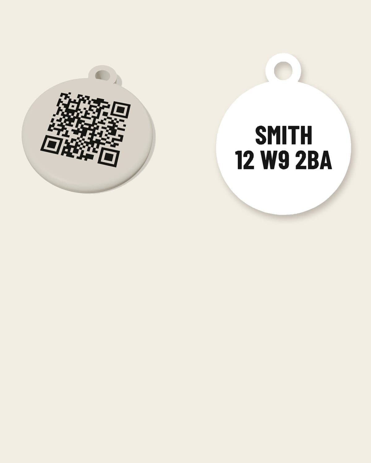 A PetTag personalised dog tag: the QR code on the front, and SMITH, 12 W9 2BA in black letters on the back